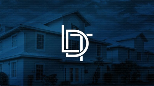 Lusk, Drasites & Tolisano logo over desaturated office building